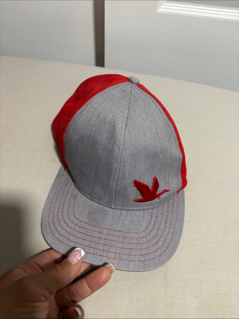 Grey and Red Trucker Cap with Embroidered Bird Logo